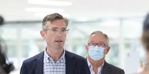 NSW Premier Dominic Perrottet and Health Minister Brad Hazzard address the media on Sunday morning.