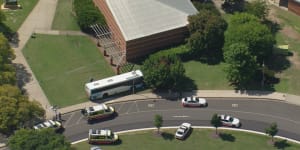 Boy,14,dies after being hit by a bus outside south-western Sydney school