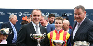 Chris Waller and fellow kiwis James McDonald celebrate Nature Strip's Galaxy with oener and All Blacks coach Steve Hansen