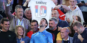 Novak Djokovic celebrates with his team,including Goran Ivanisevic (right,with yellow sleeves),after winning the Australian open.