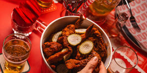 A bottomless bucket of hot wings at Belles.