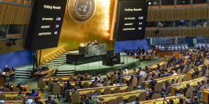 Voting results are displayed as the UN General Assembly voted on a nonbinding resolution calling for a “humanitarian truce” in Gaza.
