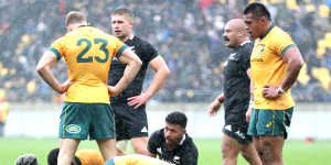 Players react after James O'Connor put the ball out to end the match.