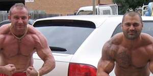 Convicted cocaine trafficker,dock worker and professional bodybuilder,Adam Powell,left,with Hakan Ayik.