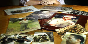 Madonna Palmer with photographs of her son Damien,who died by suicide in 1999. She gave evidence to the Senate inquiry in 2004.