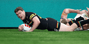 The Panthers celebrate their round five victory. 