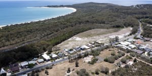 Aerial view of the razed site for a new development that will become the only visible building above the sand dunes at Main Beach in the small holiday town of South West Rocks,NSW. 30 November 2023 Photo:Janie Barrett