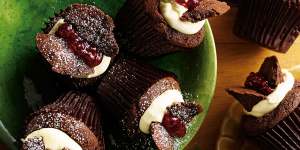 Chocolate butterfly cakes with jam and cream.