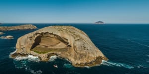 Spanning 130 metres wide,60 metres high and 60 metres deep,Cleft Island is so big it could engulf the Sydney Opera House. Wilsons Promonotory