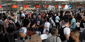 Crowds at Sydney Airport bottleneck at security where 3 of the 8 lanes are closed. 8th April 2022 Photo:Janie Barrett