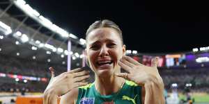 Overcome with emotion,Nina Kennedy celebrates her gold medal.