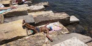 People cool off at Marrinawi Cove at Barangaroo Reserve.