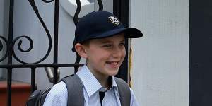 Oscar Bradfield,12,poses for first-day-of-high-school photos as he heads off to the brand new school,Inner Sydney High.