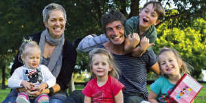Former Sydney captain Brett Kirk with his family in 2010. Son Indhi (climbing on his dad) is now a father-son prospect.