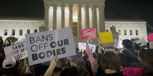 Crowds gathered outside the Supreme Court on Monday night after a draft was leaked suggesting Roe v Wade would be repealed.