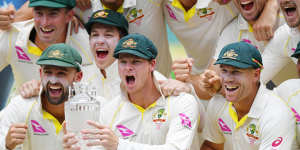 Too good:The Australian team celebrate after their 4-0 win in the Ashes.