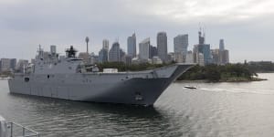 Australian planes and navy ship loaded with supplies for Tonga