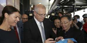 Prime Minister Scott Morrison and Liberal candidate for Reid,Fiona Martin,during a visit to Burwood.