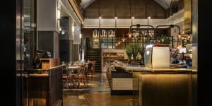 Stunning detail and glowing,golden hues evoke turn of last century Manhattan at Adelaide's stunning Sean's Kitchen,designed by Alexander and Co PIC Murray Fredericks_South Australia RESTAURANT