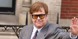 Elton John says an excess of wealth messes people up.