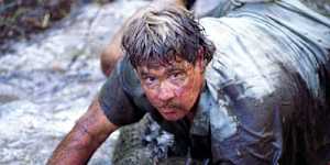 Steve Irwin jumps to avoid an angry 12-foot croc in"The Crocodile Hunter Collison Course". 