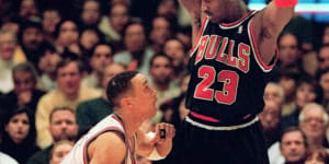 Chicago legend Michael Jordan with New York's John Starks at Madison Square Garden in 1998.