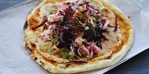 Chermoula chicken,beetroot and hummus pizza.