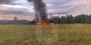 This image released by Russian media Ostorozhno Novosti shows the crash site of a private jet near the village of Kuzhenkino.