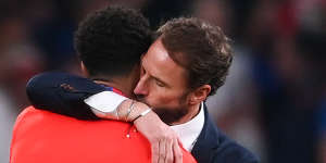 Gareth Southgate,who himself missed a crunch penalty at Euro ’96,consoles a player.