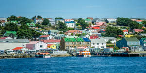 Colourful homes dominate the barren landscape of the capital city of the windblown islands in the South Atlantic Ocean.