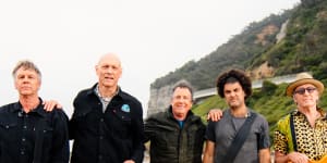 Midnight Oil’s Martin Rotsey,Peter Garrett,Rob Hirst,touring member Adam Ventoura and Jim Moginie on the set of The Sound,airing Sunday on ABC. 