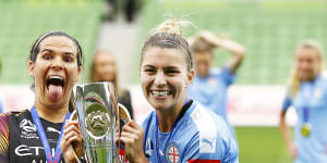 Lydia Williams and Steph Catley celebrate a fourth W-League title for Melbourne City. 