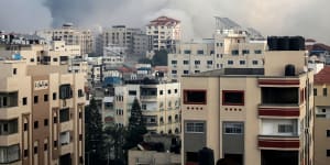 A residential area of Gaza City,which Israel has been pummelling with air strikes. A ground invasion is expected to follow.