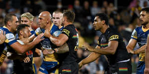 Blake Ferguson squabbles with Penrith players after he was accused of milking a penalty.