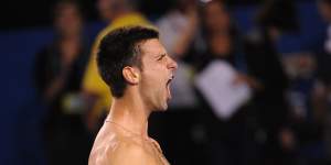 Novak Djokovic celebrates his Australian Open win over Rafael Nadal in 2012.