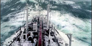 The tanker Stolt Surf faces a huge wave in 1977. The photo was taken from the bridge 22 metres above sea level,which the wave then crashed on top of,leaving a twisted metal gangway above deck and wreckage below. 