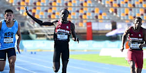 Gout Gout waves during his run in the 100 metres in the Australian Athletics junior championships.