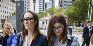 Political staffer Sally Rugg (left) arrives at Federal Court with her partner,actor Kate McCartney.