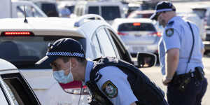 Police conduct public health order compliance checks at Bondi Beach on Sunday.