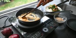 Making scrambled eggs on a portable induction cooker.