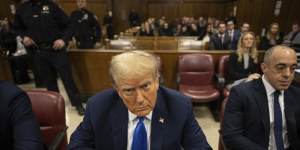 Donald Trump awaits the start of proceedings at the Manhattan Criminal Court.