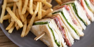 Good Food. Club sandwich with fries served at The Cosmopolitan in Double Bay,Sydney on February 26,2020. Photo:Dominic Lorrimer