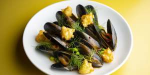 Mussels primavera with broad beans,fresh peas and a few little fried polenta nuggets.