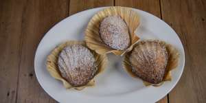 Madeleines are baked to order in scallop shells. 