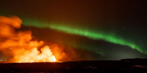 Volcano erupts during the Northern Lights