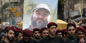 Hezbollah militants carry the coffin of slain commander Imad Mughniyah through the streets of Beirut in 2008.
