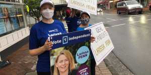 Supporters of independent candidate Larissa Penn outside Gladys Berejiklian’s electoral office before the byelection campaign kicked off.