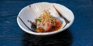 The go-to dish:Kingfish sashimi with black garlic and butter ponzu.