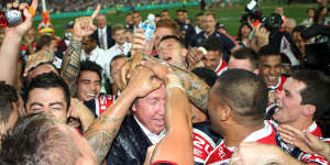 Trent Robinson and the Roosters celebrate grand final glory in 2013.
