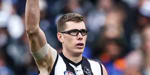 Hands up who wants a new contract:Mason Cox has re-signed for two more years at the Magpies. 